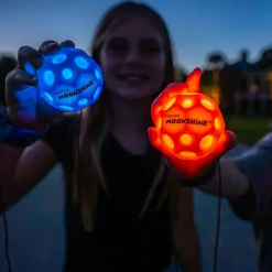 Pelota con cuerda elástica para muñeca LED · Waboba